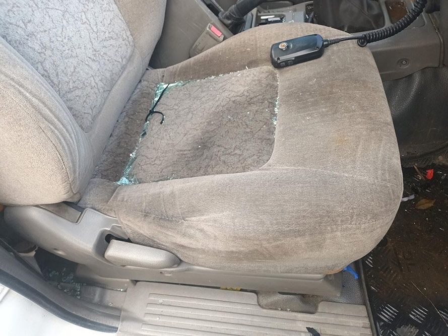 A Car Seat with a Remote Control Attached to It — South West 4WD Wreckers in Harristown, QLD