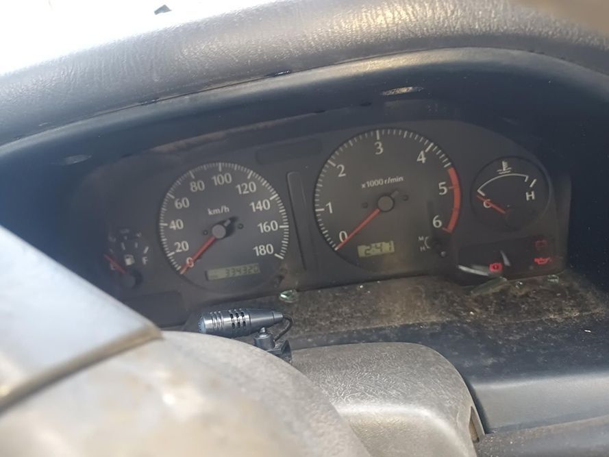 A Close Up of a Car Dashboard with a Speedometer and a Tachometer — South West 4WD Wreckers in Harristown, QLD