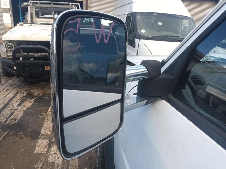 A Close Up of a Side View Mirror on a White Truck — South West 4WD Wreckers in Harristown, QLD
