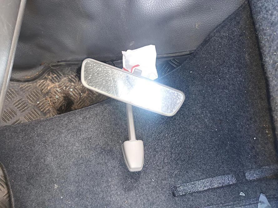 A Rear View Mirror is Sitting on the Floor of a Car — South West 4WD Wreckers in Harristown, QLD
