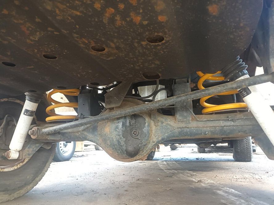 A Close Up of the Underside of a Car with Shocks — South West 4WD Wreckers in Harristown, QLD