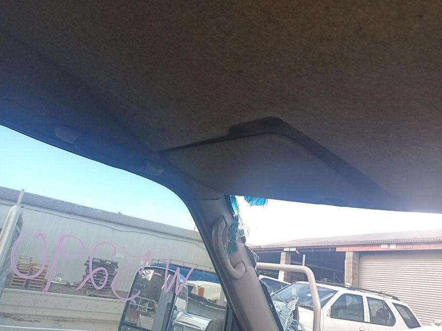 A Car Roof with a Sun Visor on It — South West 4WD Wreckers in Harristown, QLD