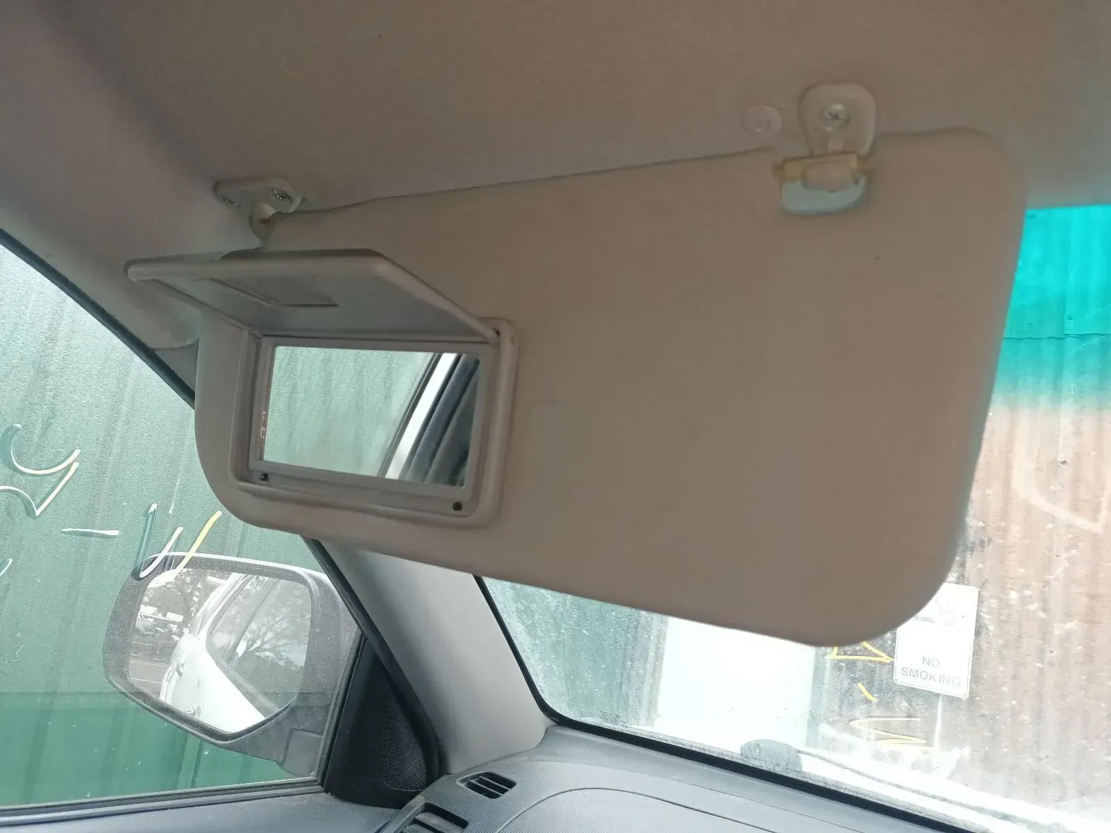 Beige Car Sun Visor With Mirror Open, Inside the Car — South West 4WD Wreckers In Brisbane, QLD