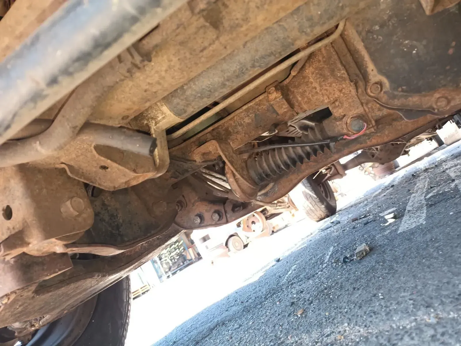 Rust-covered Underside of a Vehicle, Showing Suspension Components — South West 4WD Wreckers In Brisbane, QLD