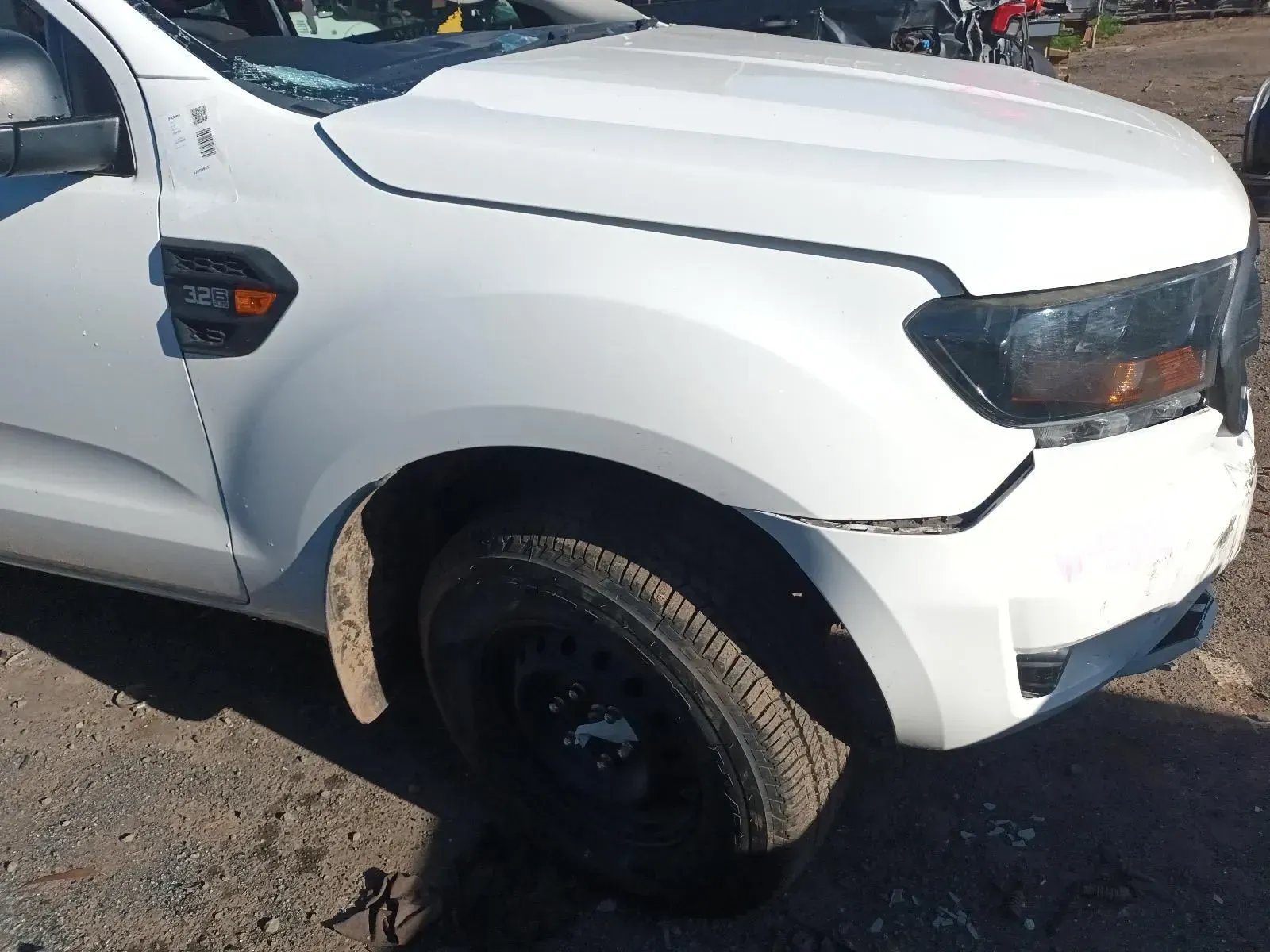White Ford Truck, Front Quarter View, With Damaged Fender and Headlight — South West 4WD Wreckers In Brisbane, QLD
