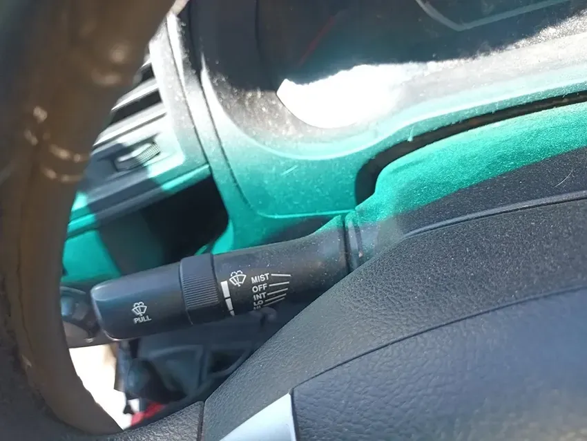A Close Up of a Car Steering Wheel With a Switch That Says Wiper on It — South West 4WD Wreckers In Brisbane, QLD