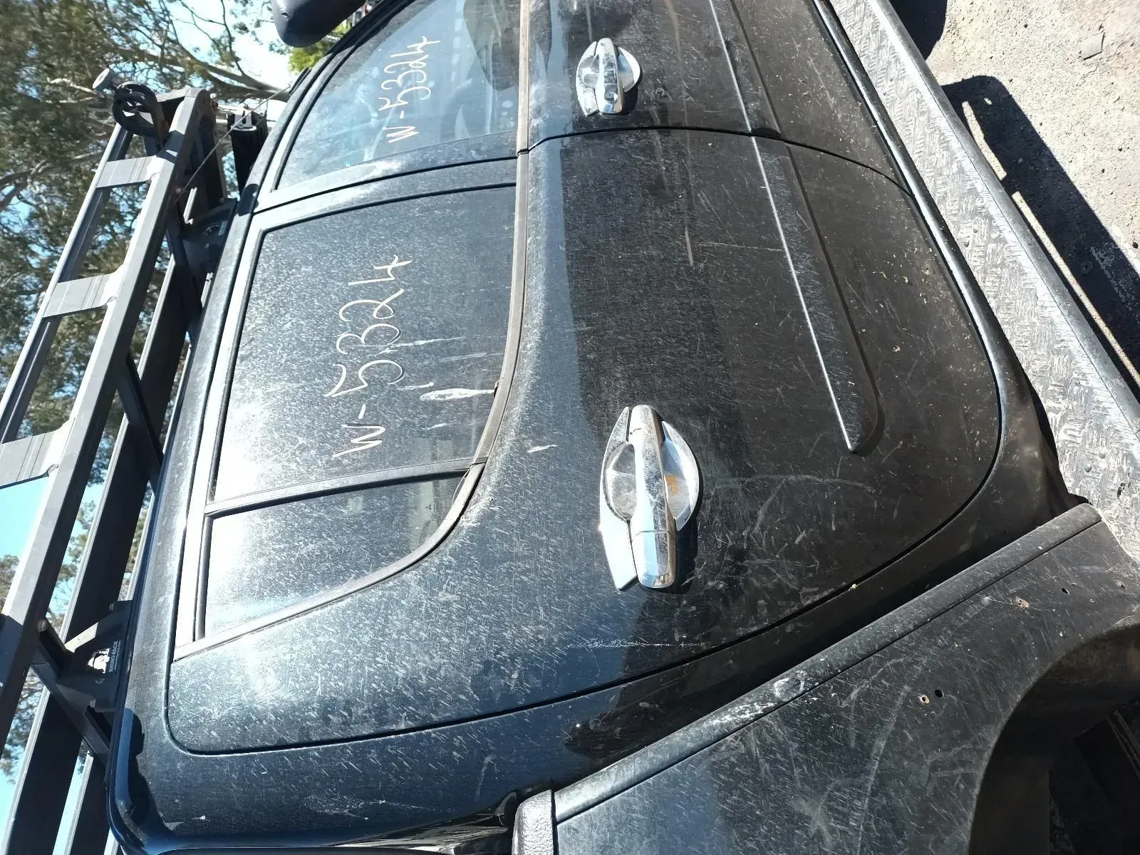 Black Vehicle Roof With Side Handles and a Roof Rack — South West 4WD Wreckers In Brisbane, QLD