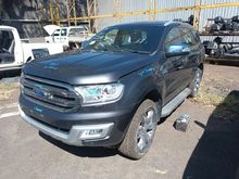 A Black Truck With a White Bed is Parked on the Side of the Road — South West 4WD Wreckers In Brisbane, QLD