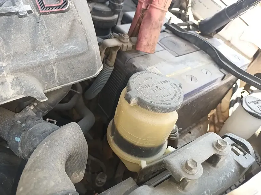 A Close Up of a Car Engine With a Yellow Container in the Middle — South West 4WD Wreckers In Brisbane, QLD