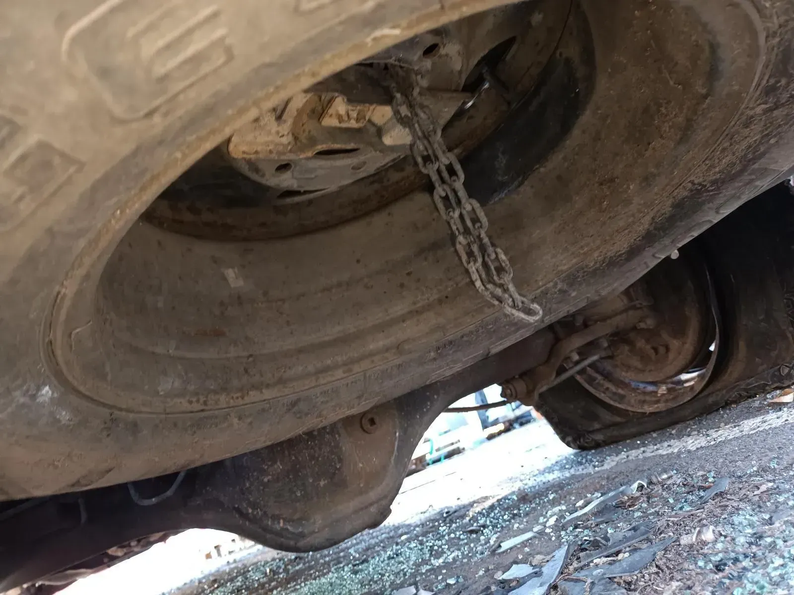 Underside View of a Vehicle With a Flat Tyre — South West 4WD Wreckers In Brisbane, QLD