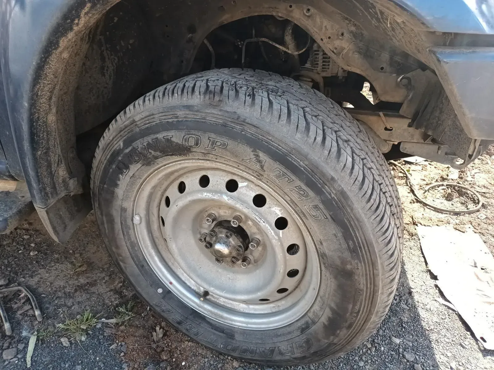 Close-up of a Dirty Car Tyre on a Steel Rim — South West 4WD Wreckers In Brisbane, QLD