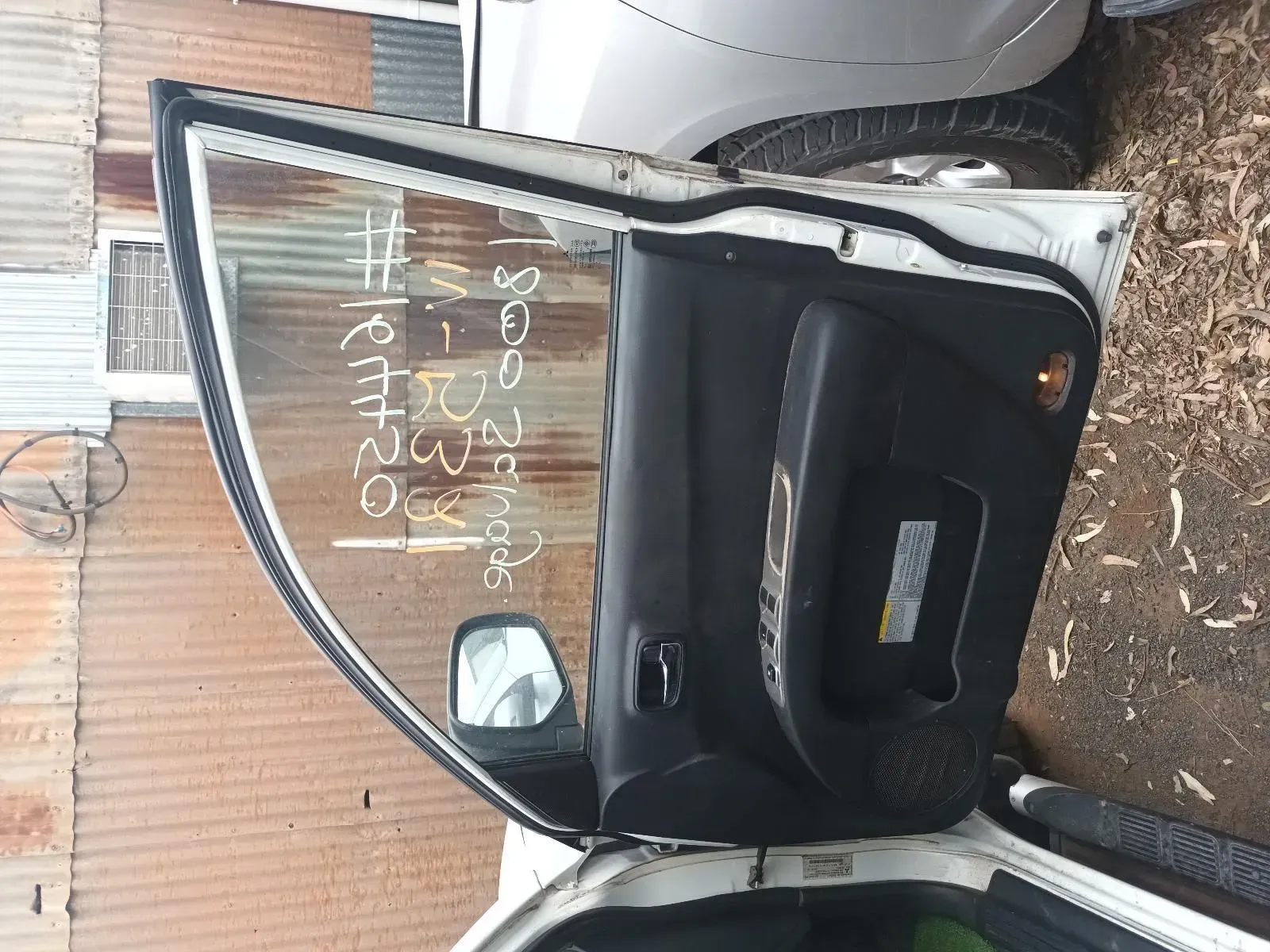 White Car Door With Window Glass and Black Interior Panel — South West 4WD Wreckers In Brisbane, QLD