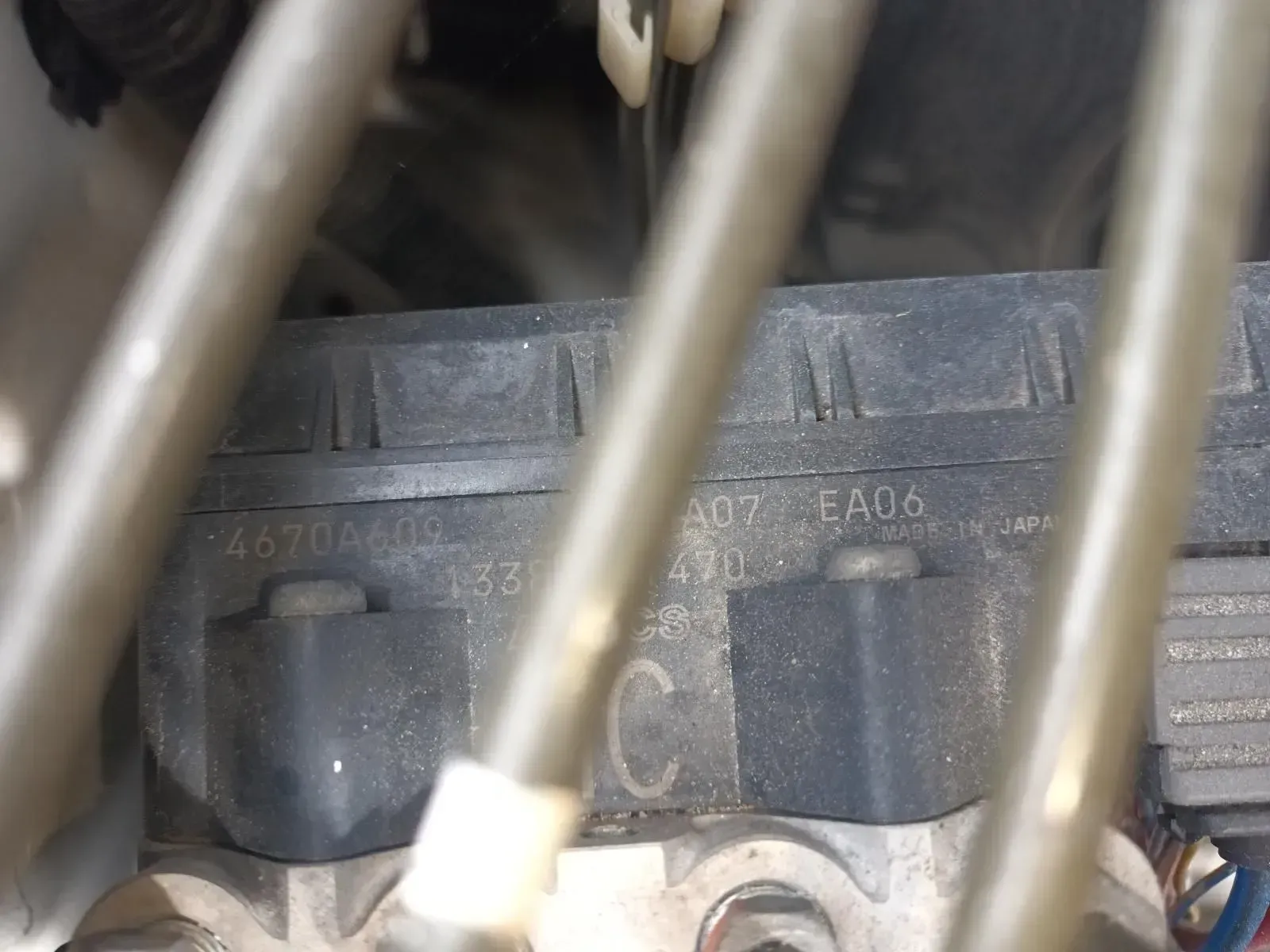 Black Car Part With Numbers and Wires — South West 4WD Wreckers In Brisbane, QLD