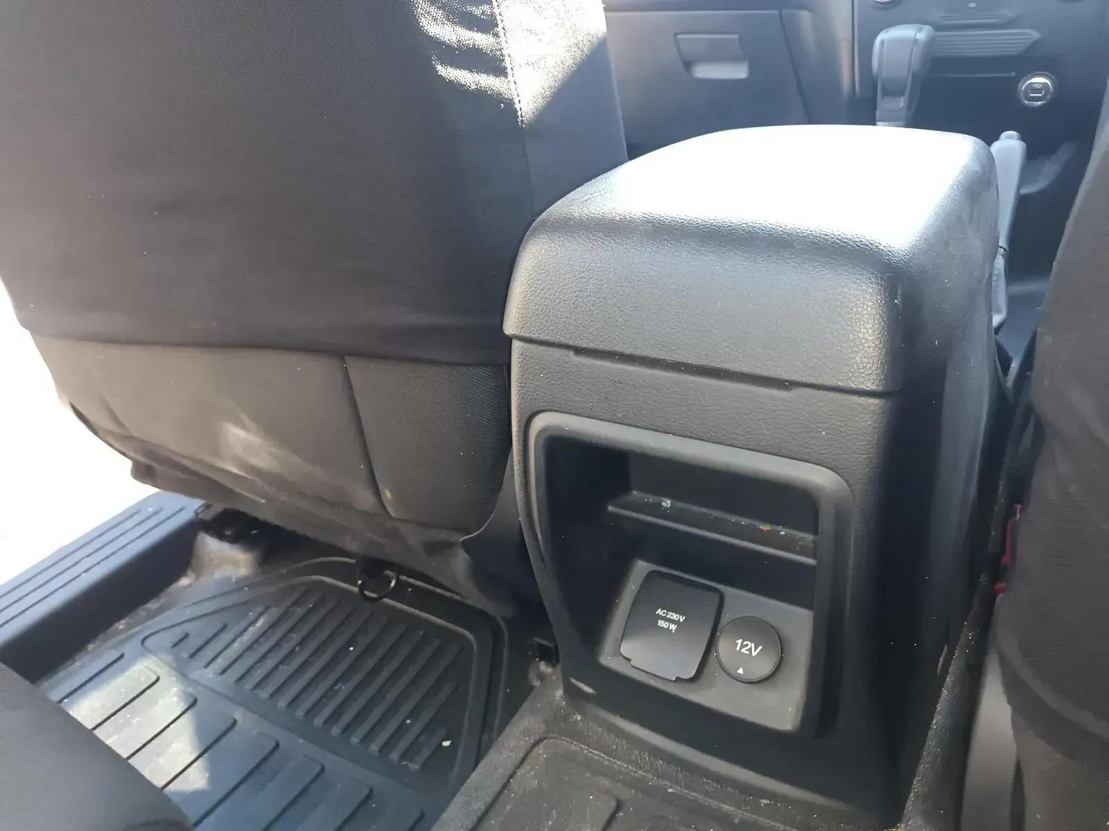 Black Car Console With Power Outlet and Storage Area Between the Back Seats — South West 4WD Wreckers In Brisbane, QLD