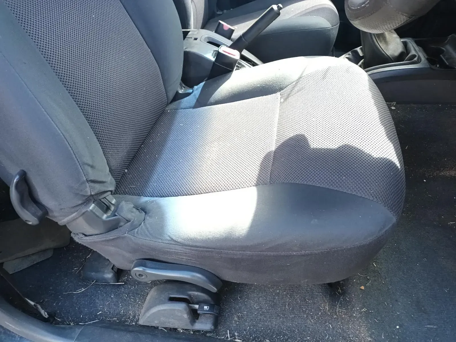 Car Seat, Gray Fabric, With Adjustment Levers, in a Vehicle Interior — South West 4WD Wreckers In Brisbane, QLD