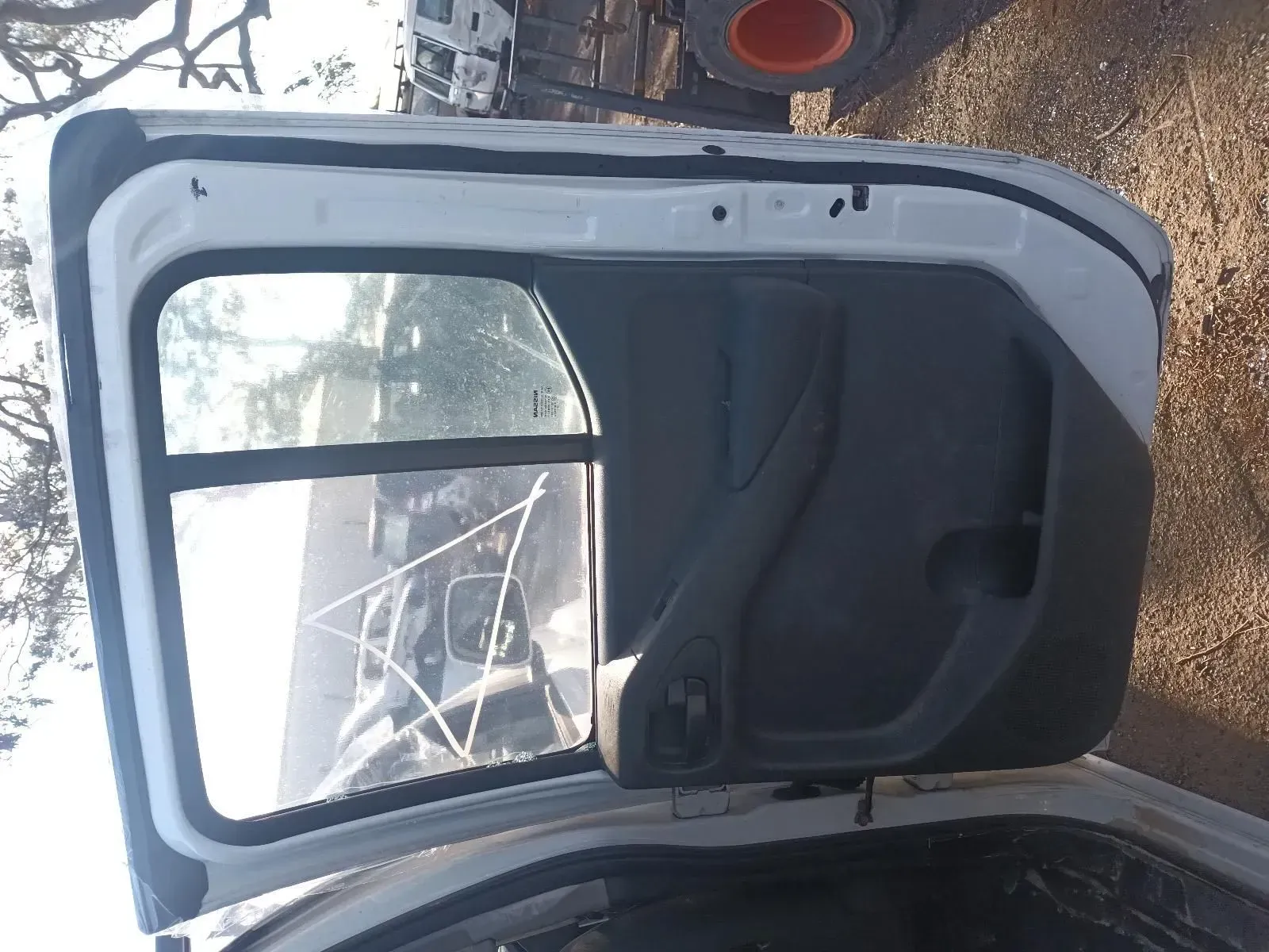 White Vehicle Door With Window and Black Interior Detailing, Outdoors — South West 4WD Wreckers In Brisbane, QLD