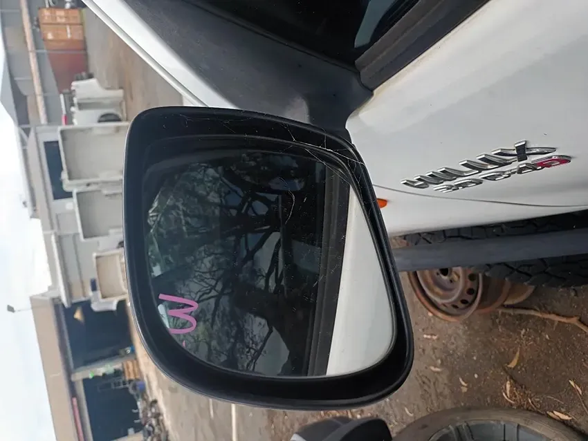A Close Up of a Side View Mirror on a White Car — South West 4WD Wreckers In Brisbane, QLD