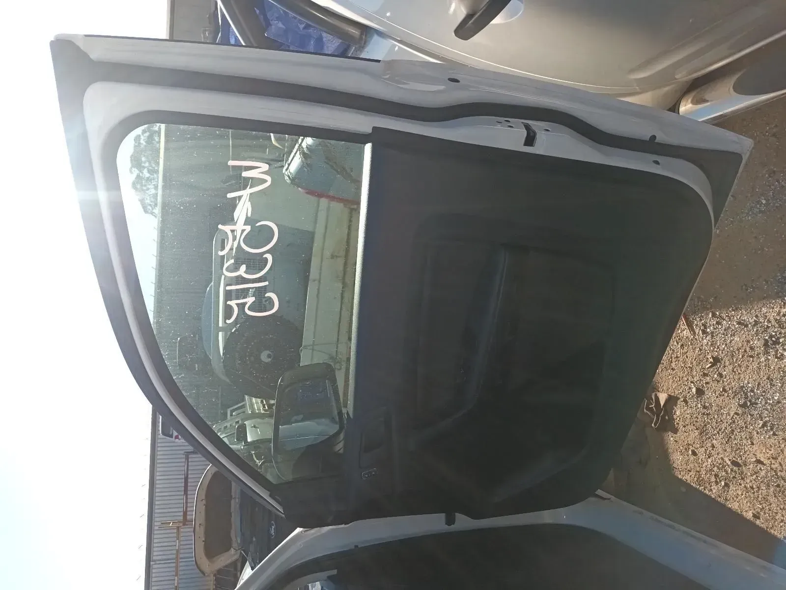 White Car Door With a Dark Tinted Window, Outdoors — South West 4WD Wreckers In Brisbane, QLD