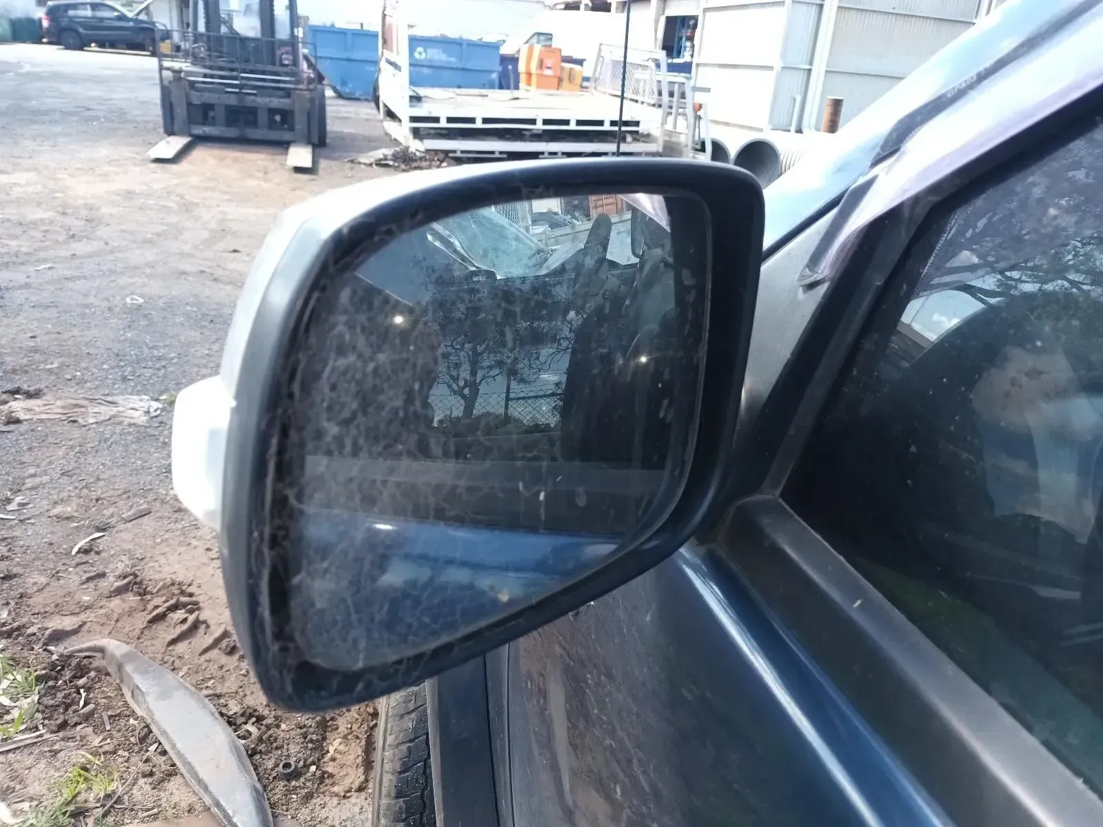 Side Mirror on a Dark-colored Vehicle — South West 4WD Wreckers In Brisbane, QLD