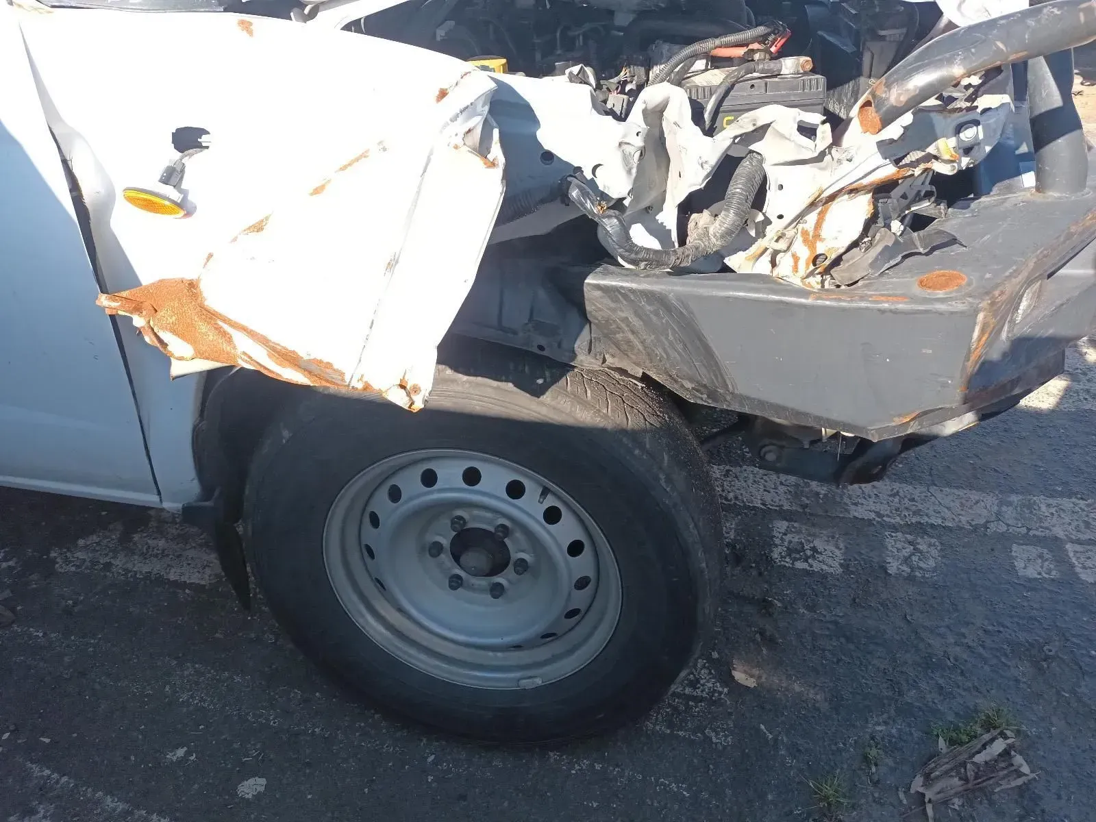 White Pickup Truck, Heavily Damaged, Crumpled Front End, Flat Tyre, Exterior — South West 4WD Wreckers In Brisbane, QLD