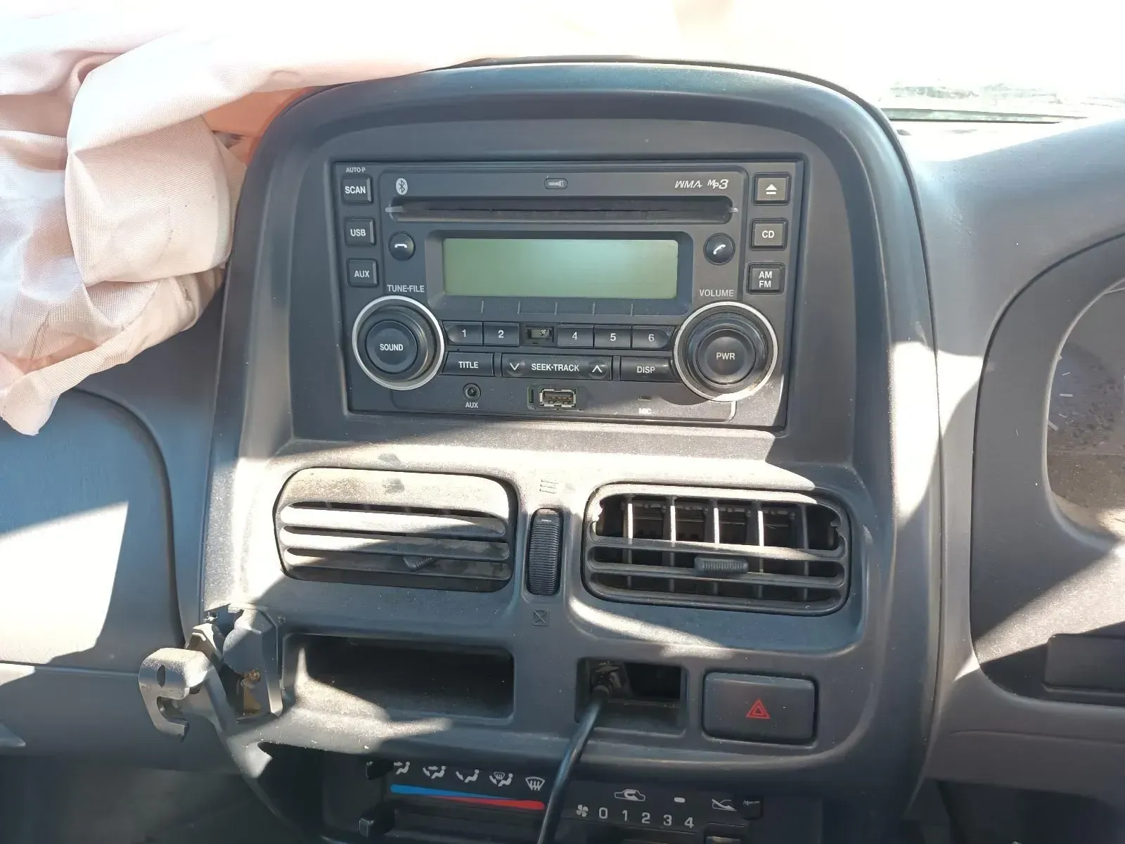 Car Dashboard With a Radio, Vents, and an Airbag Deployed — South West 4WD Wreckers In Brisbane, QLD