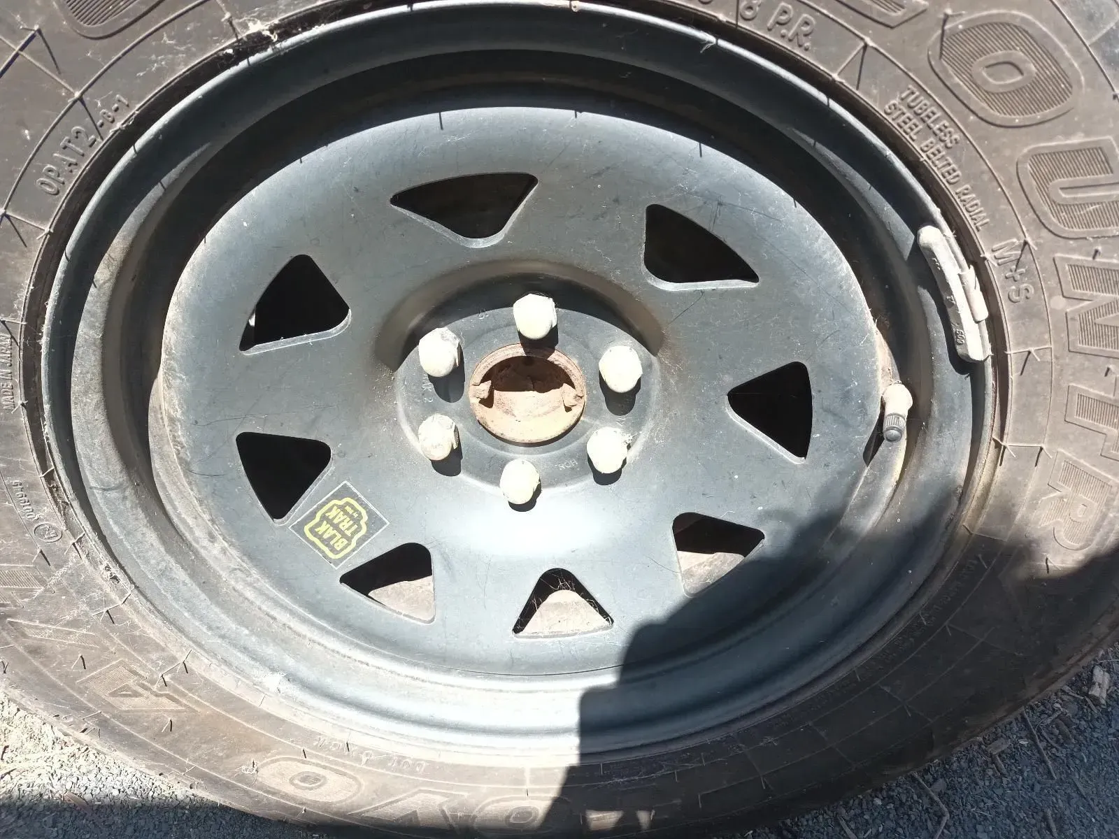 Black Car Wheel With Tyre — South West 4WD Wreckers In Brisbane, QLD