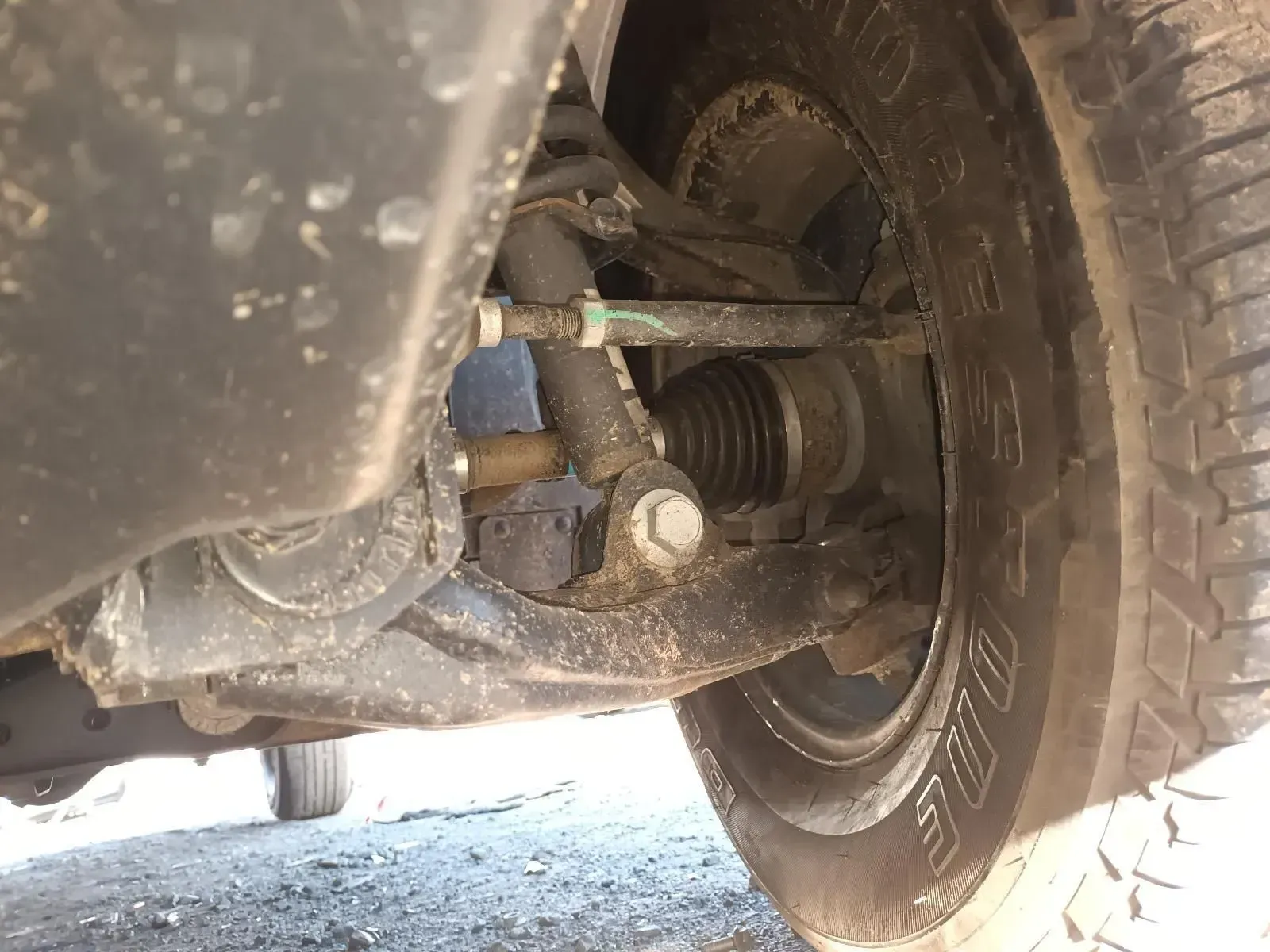 Undercarriage of a Vehicle Showing the Wheel, Suspension, and Steering Components — South West 4WD Wreckers In Brisbane, QLD