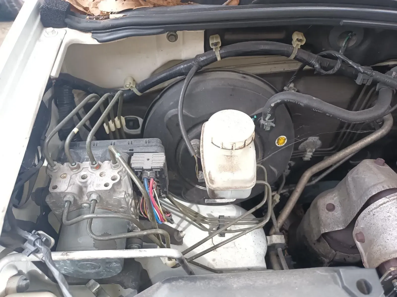 Engine Bay With Brake Booster, Master Cylinder, and Abs Module — South West 4WD Wreckers In Brisbane, QLD