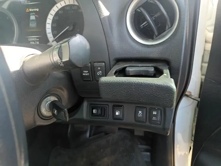 A Close Up of a Car Dashboard with a Cup Holder — South West 4WD Wreckers In Brisbane, QLD