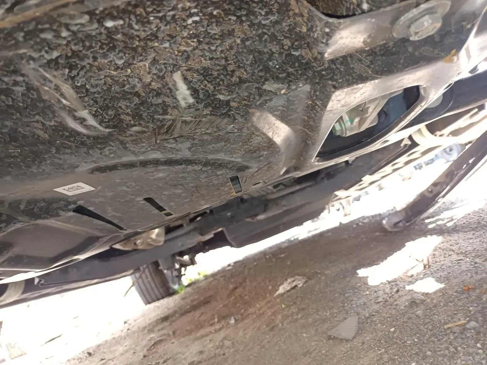 Underside View of a Car, Showing a Black Undercarriage Panel — South West 4WD Wreckers In Brisbane, QLD