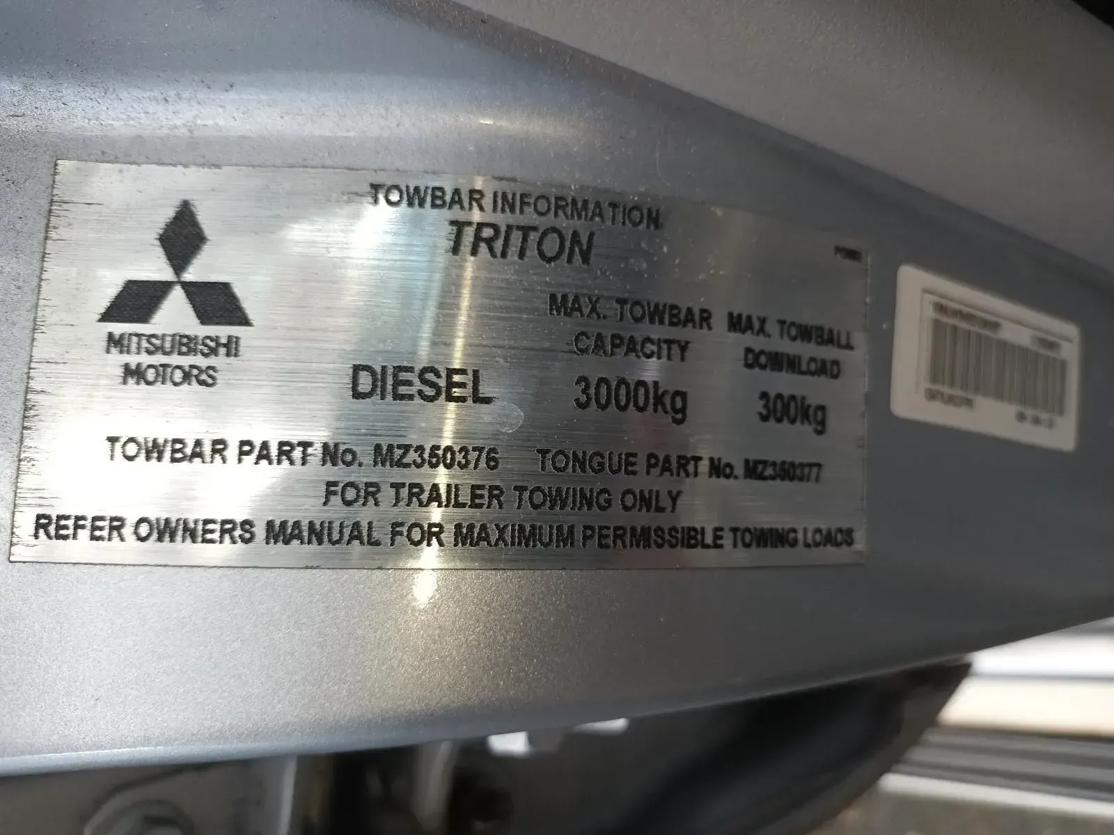 Metal Vehicle Information Label From a Mitsubishi Triton — South West 4WD Wreckers In Brisbane, QLD