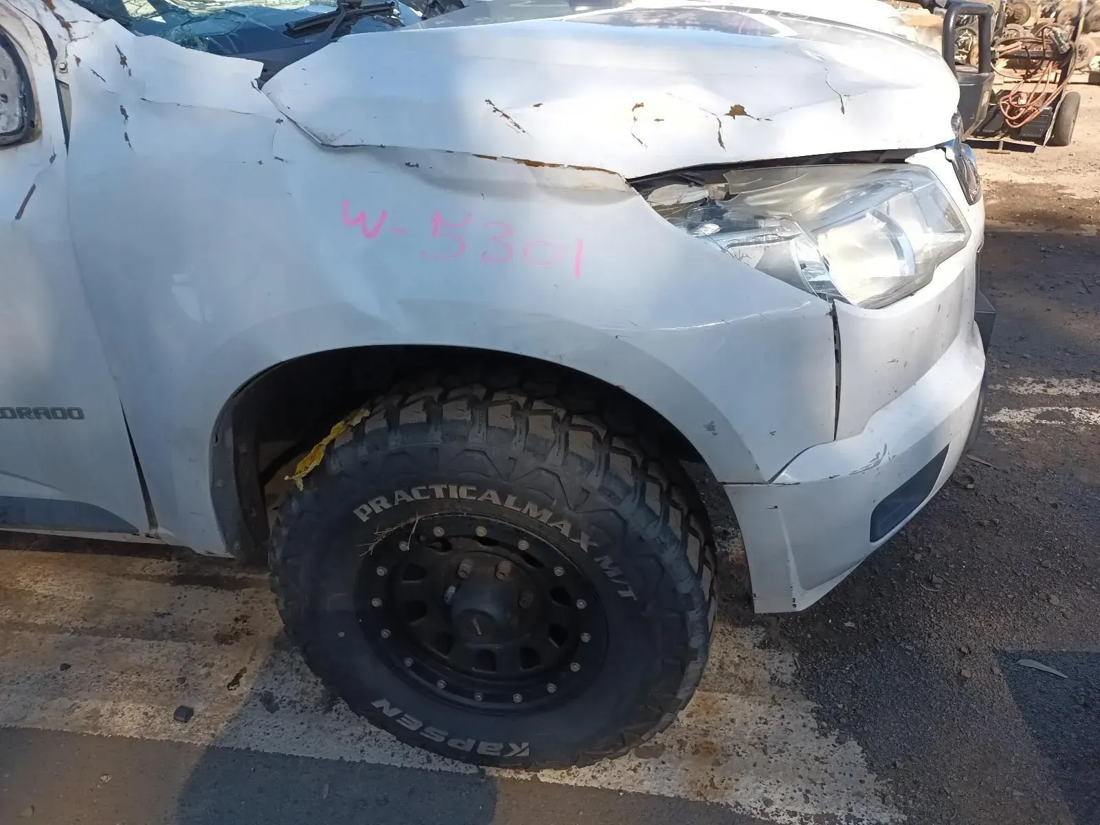 Damaged Silver Pickup Truck With a Smashed Front Fender and Tyre — South West 4WD Wreckers In Brisbane, QLD