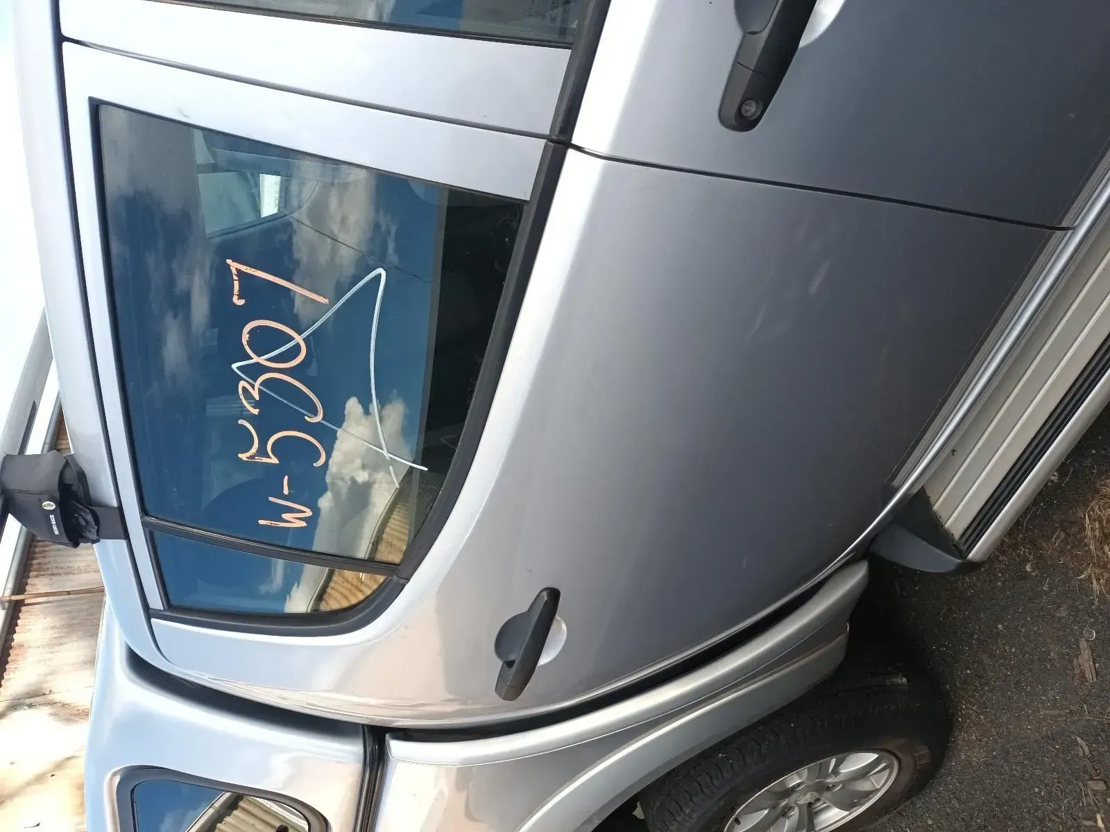 Silver Car Door With the Number — South West 4WD Wreckers In Brisbane, QLD