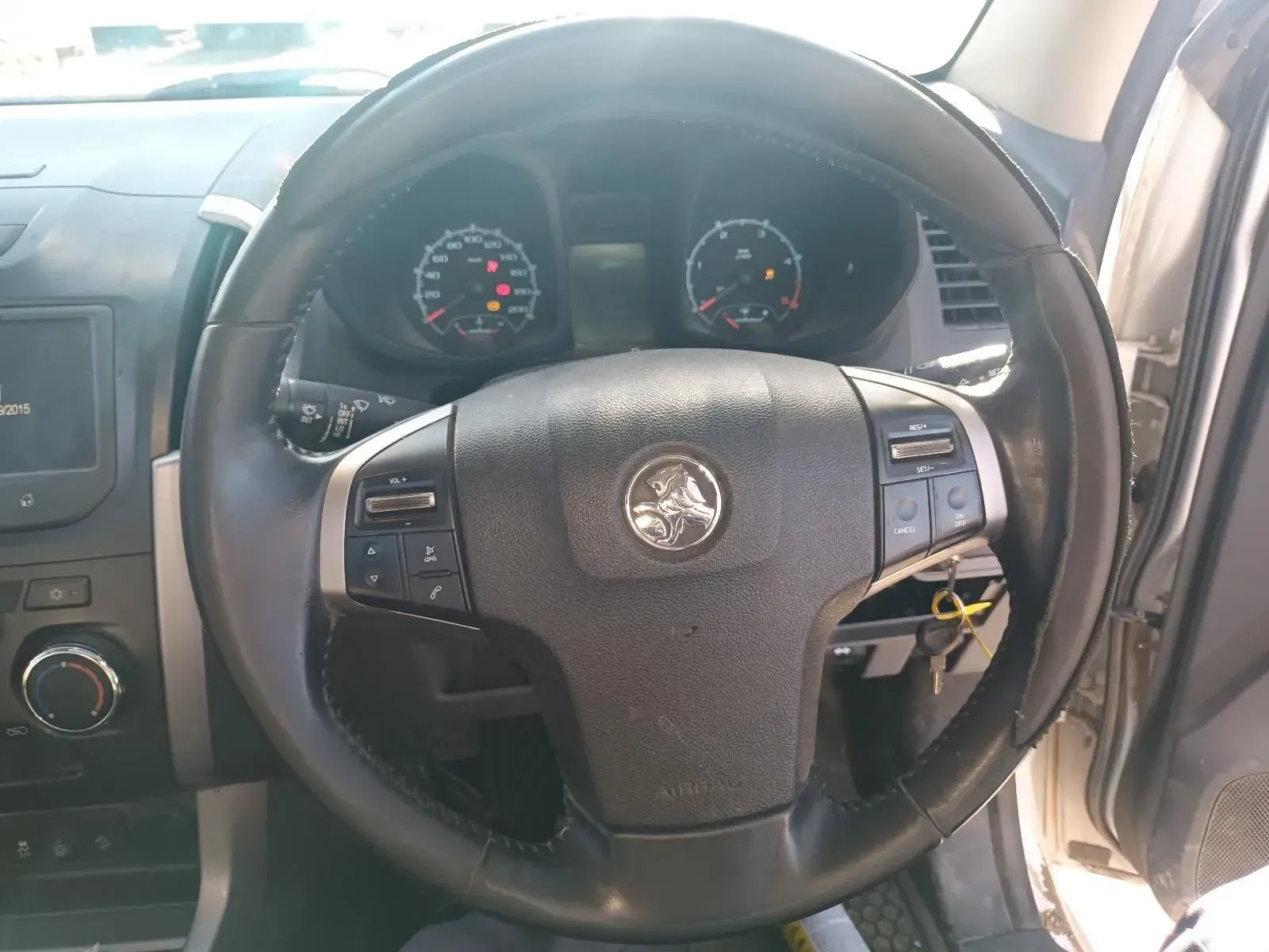 Steering Wheel of a Holden Car With Gauges Visible in the Background — South West 4WD Wreckers In Brisbane, QLD