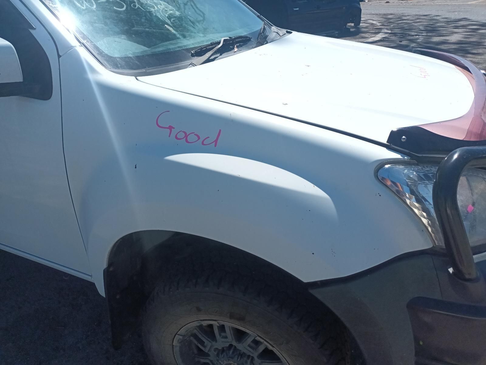 A White Truck With the Word Good Written on the Hood — South West 4WD Wreckers In Brisbane, QLD