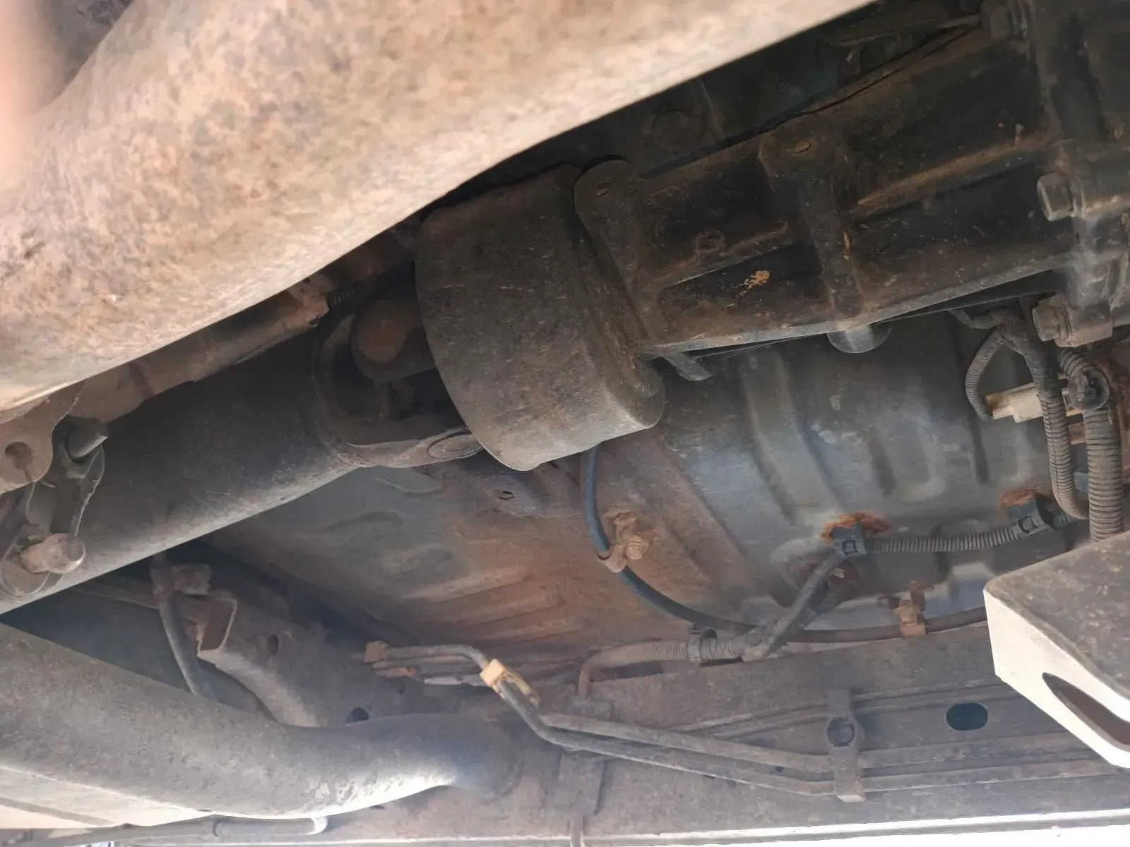 Undercarriage of a Vehicle With a Driveshaft, Exhaust Pipes — South West 4WD Wreckers In Brisbane, QLD