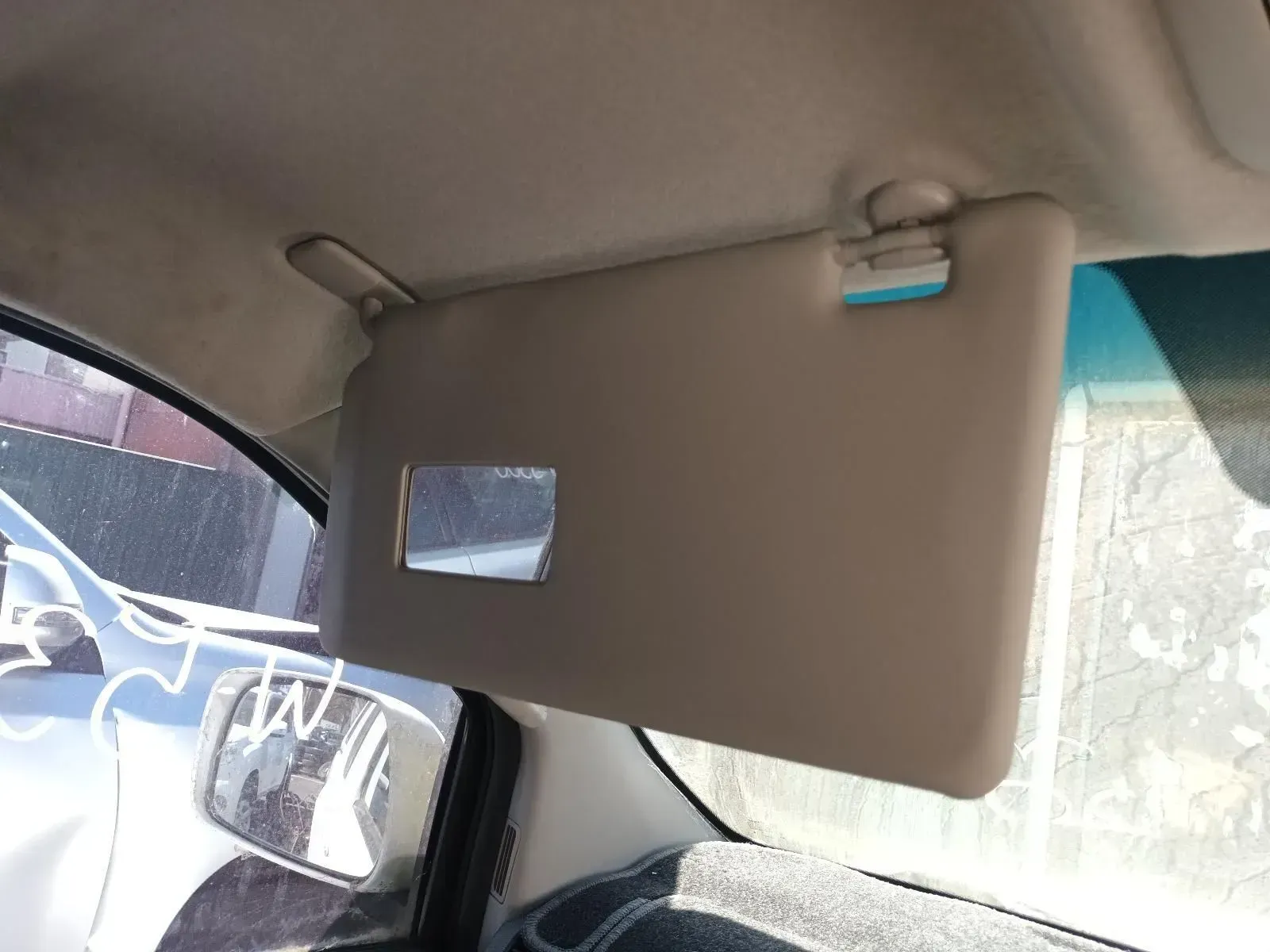 Tan Car Sun Visor With a Built-in Mirror, in a Car Interior — South West 4WD Wreckers In Brisbane, QLD