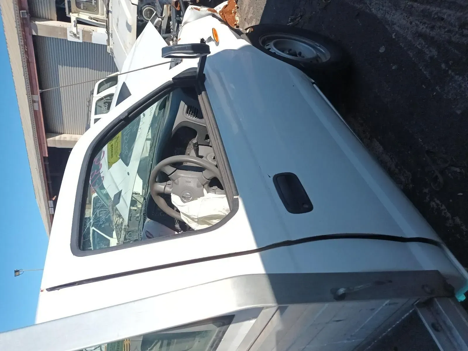 White Truck Cab With Open Door, Revealing the Interior — South West 4WD Wreckers In Brisbane, QLD