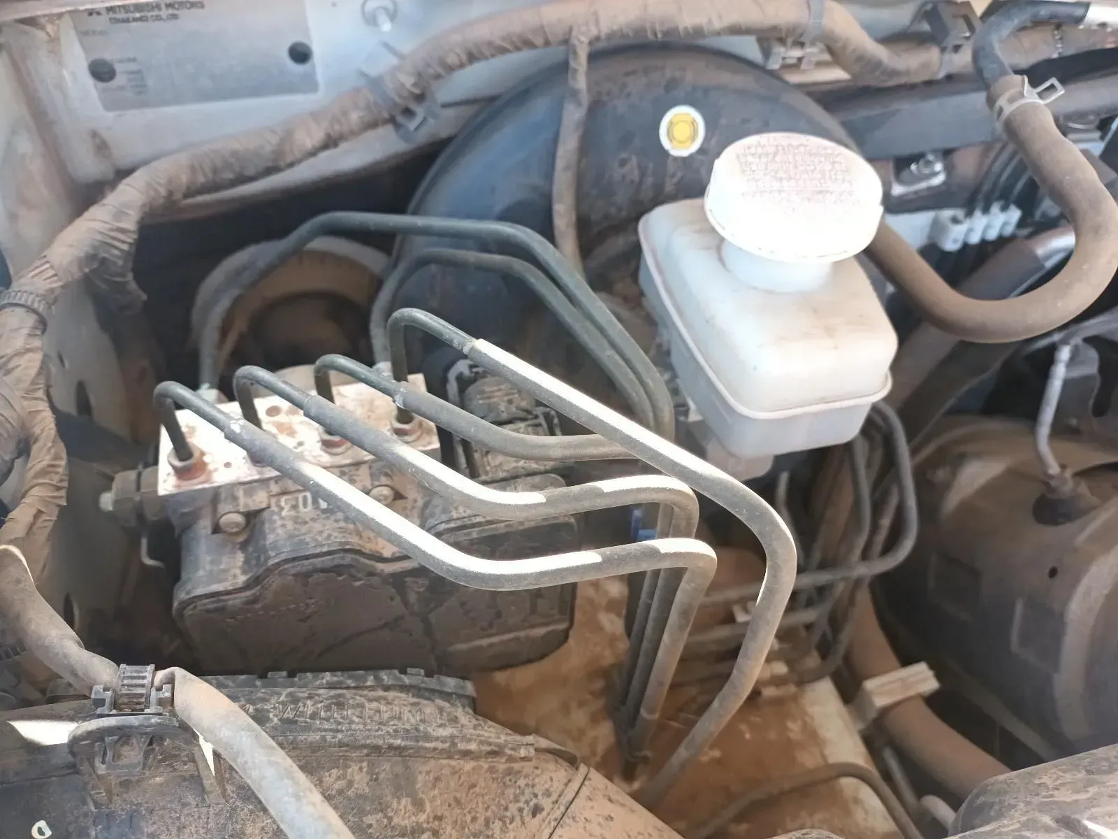 Engine Bay With Brake Master Cylinder, Abs Module, and Brake Lines — South West 4WD Wreckers In Brisbane, QLD