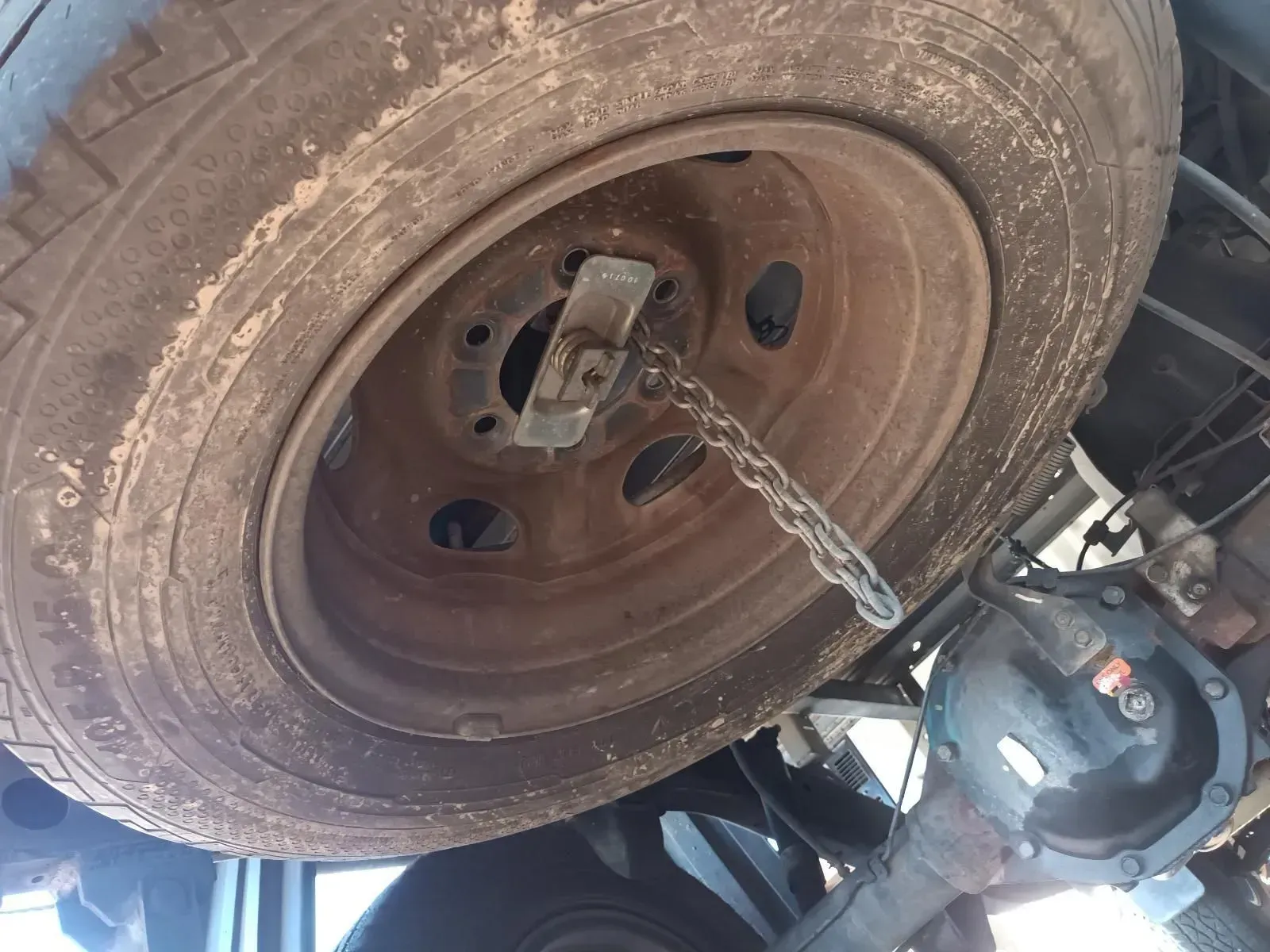 Spare Tyre Mounted Under a Vehicle — South West 4WD Wreckers In Brisbane, QLD