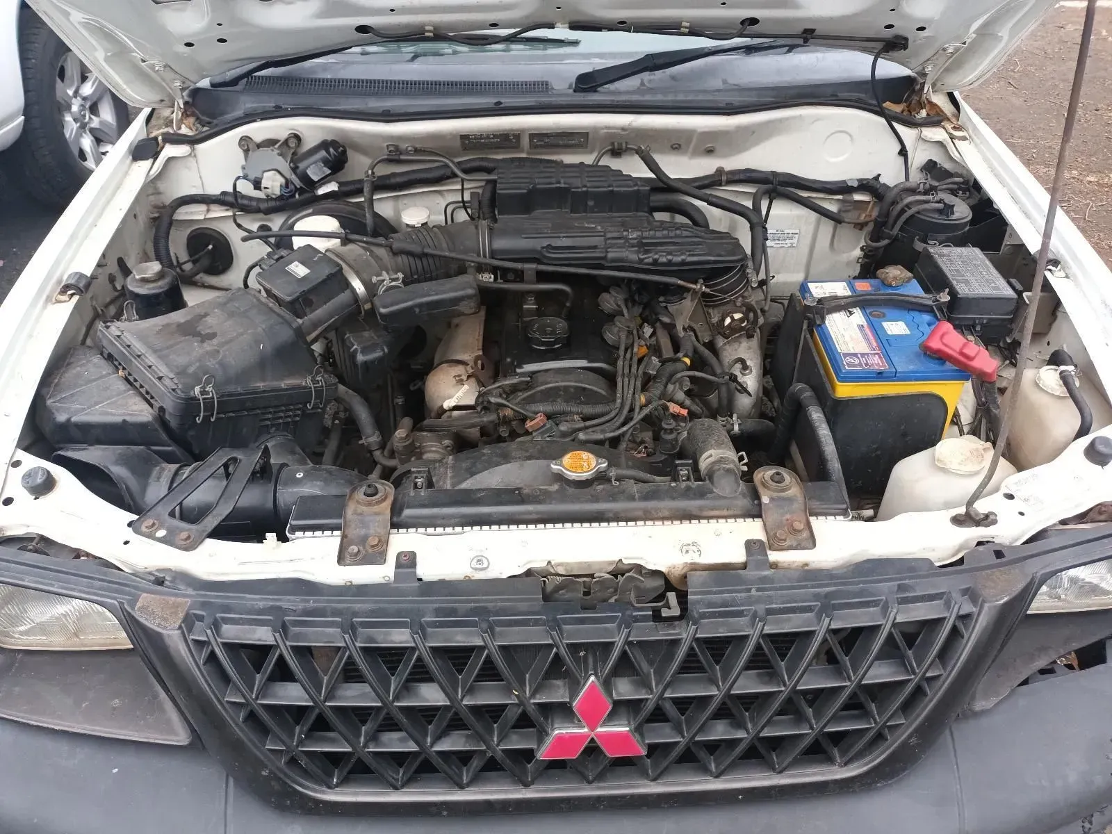 White Car Engine Bay, Open Hood — South West 4WD Wreckers In Brisbane, QLD