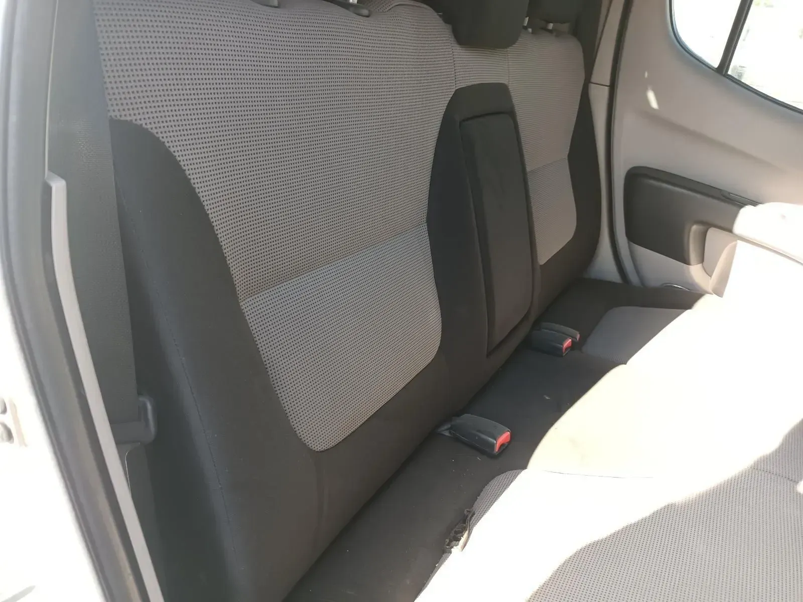 Back Seat of a White Car With Gray Patterned Fabric and Black Trim — South West 4WD Wreckers In Brisbane, QLD