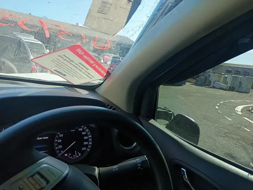 The Inside of a Car with a Parking Ticket on the Windshield — South West 4WD Wreckers In Brisbane, QLD
