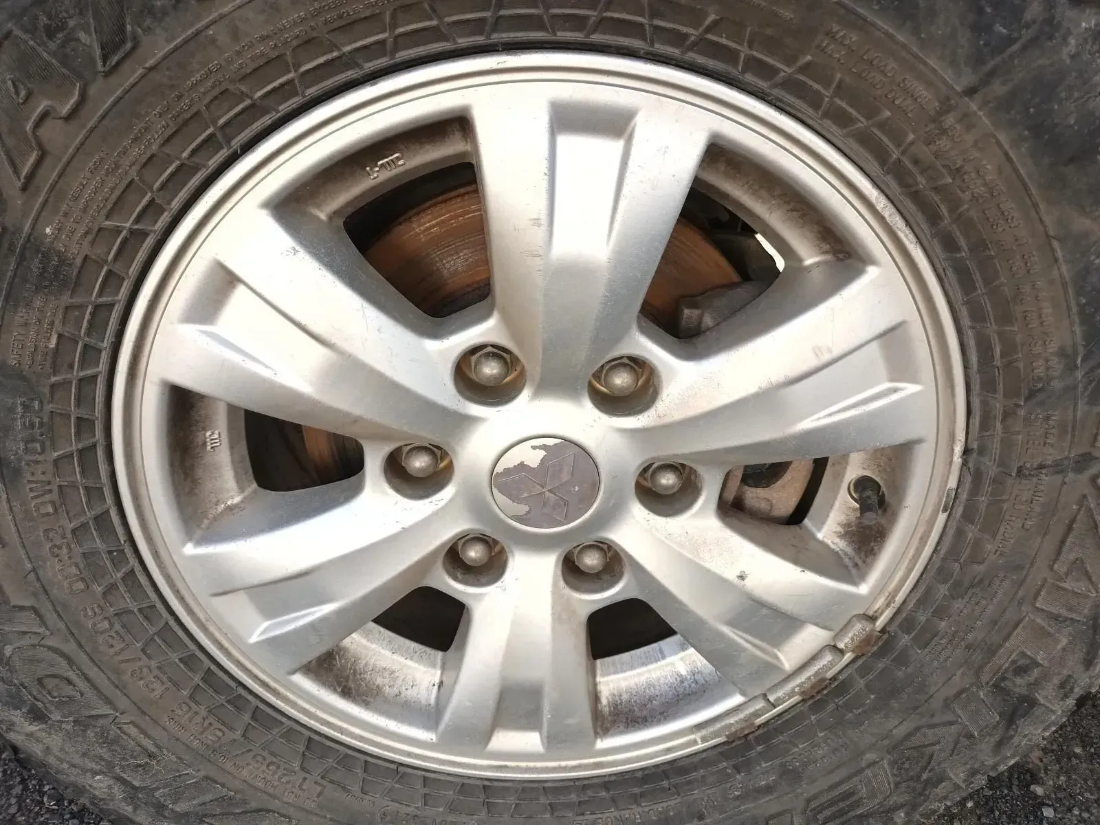 Silver Car Wheel With a Worn Tyre — South West 4WD Wreckers In Brisbane, QLD