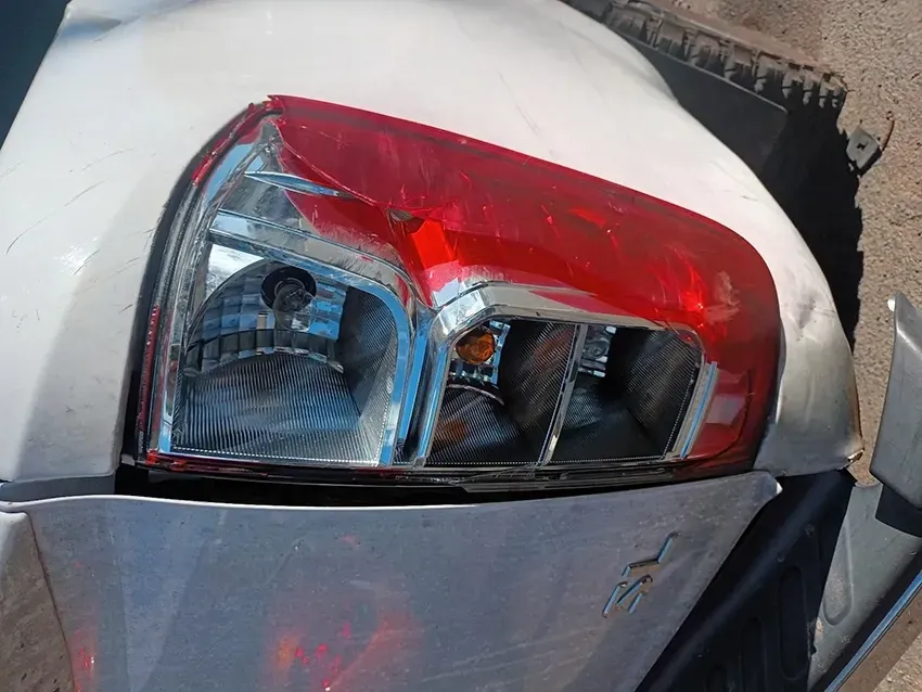 A Close Up of a Car's Tail Light with a Damaged Bumper — South West 4WD Wreckers In Brisbane, QLD