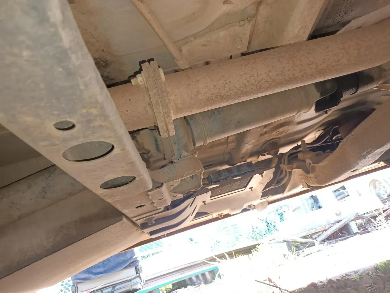 Underside of a Vehicle With Exhaust Pipe and Frame Visible — South West 4WD Wreckers In Brisbane, QLD