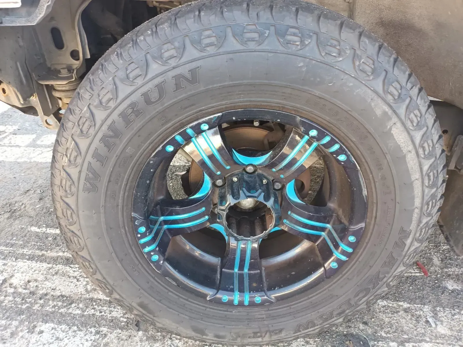 Black and Blue Car Wheel With Winrun Tyre — South West 4WD Wreckers In Brisbane, QLD