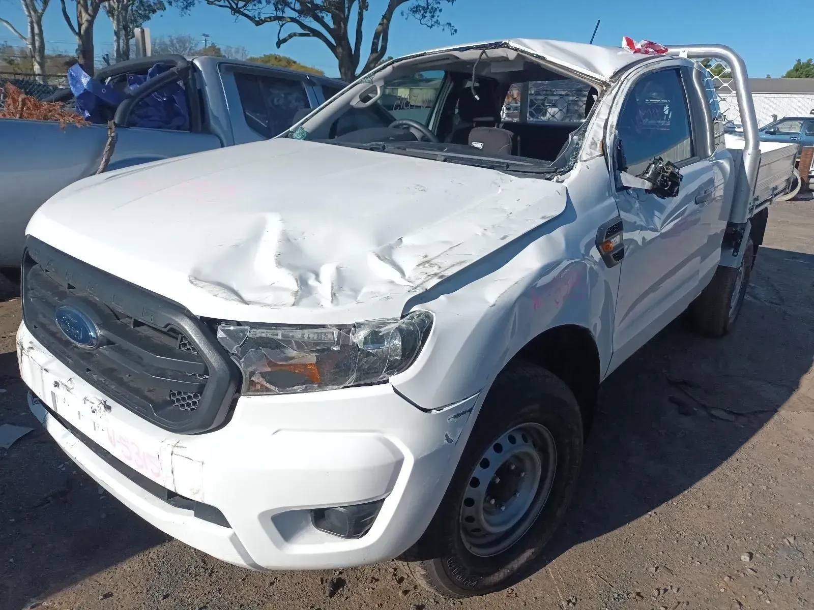 White Ford Ranger Pickup Truck With Significant Front-end and Roof Damage — South West 4WD Wreckers In Brisbane, QLD