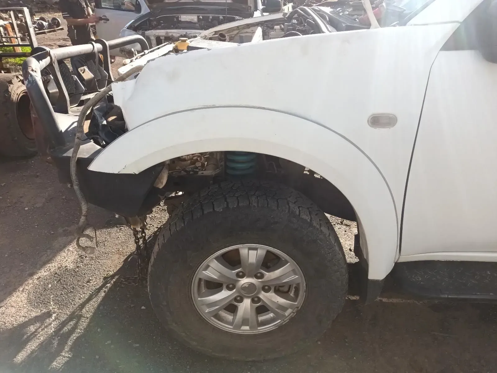 White Truck Front With Damaged Fender, Tyre, and Wheel — South West 4WD Wreckers In Brisbane, QLD