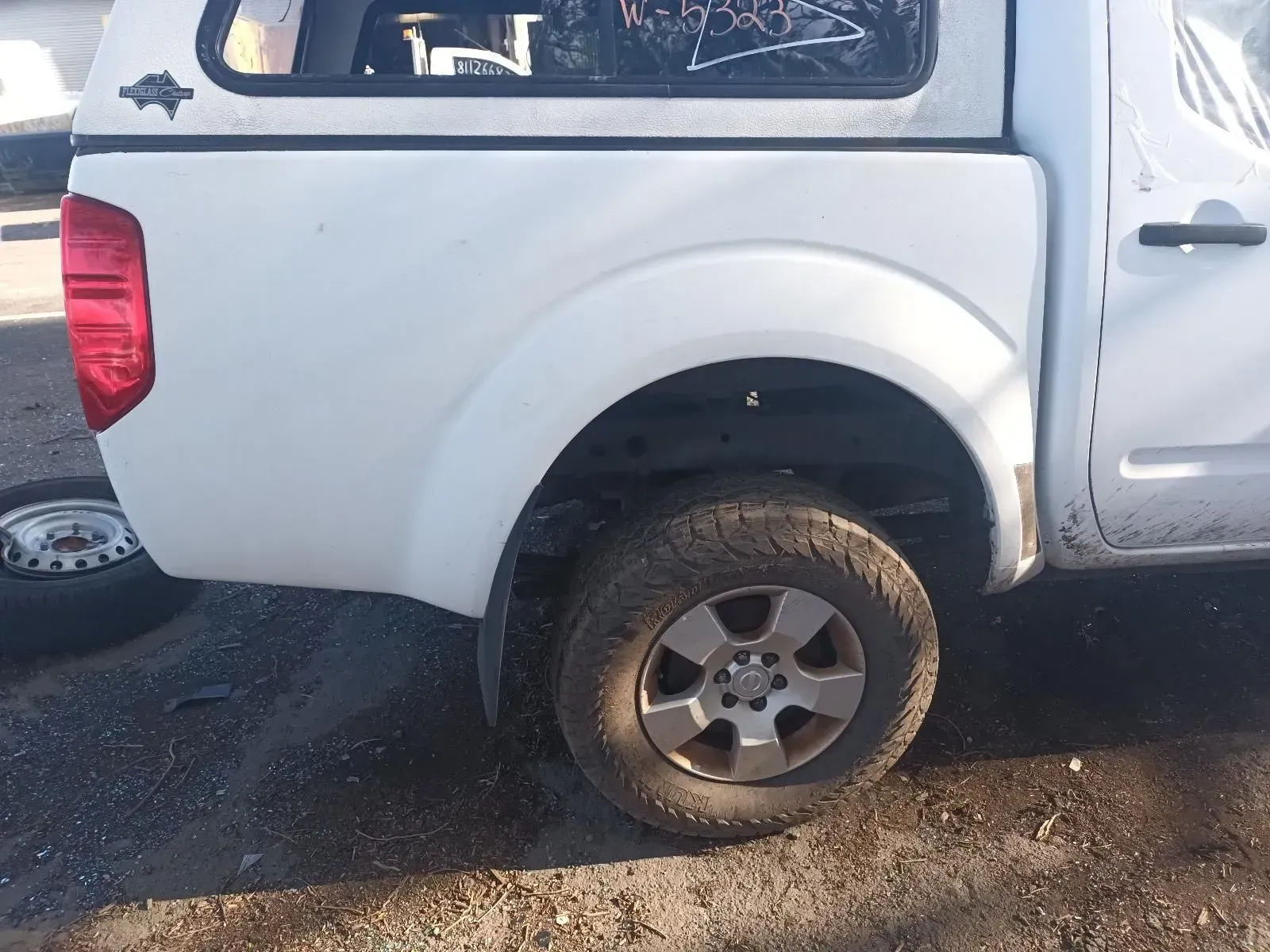 White Pickup Truck, With a Canopy, Parked on Gravel — South West 4WD Wreckers In Brisbane, QLD